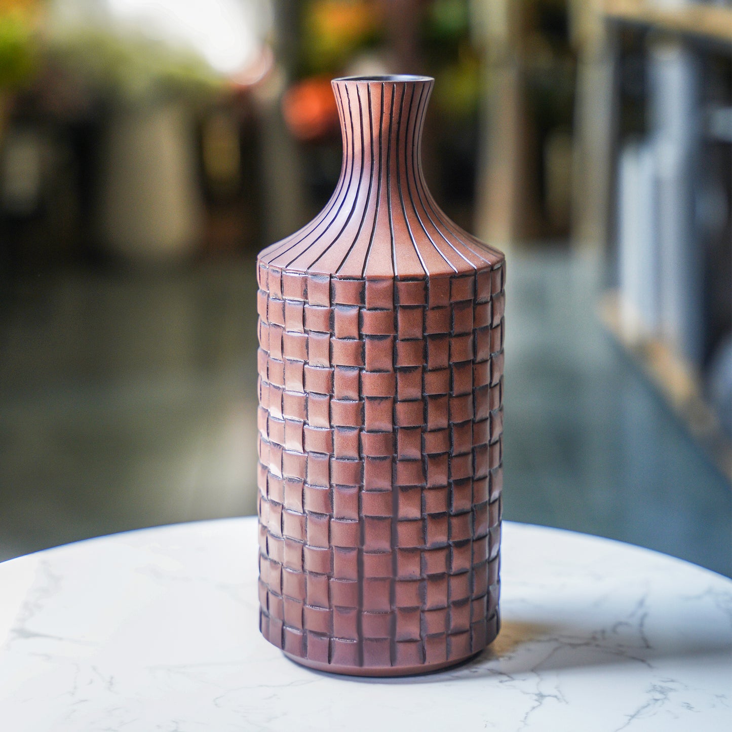 brown checked and striped pattern vase