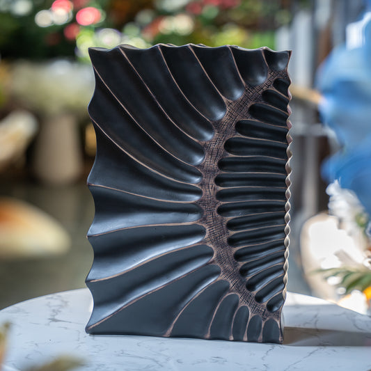 Black Sculpted Vase with Radiating Ridge Pattern